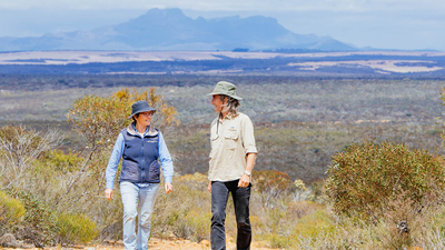 Bush Heritage ecologist Angela Sanders and Healthy Landscape Manager Simon Smale, with the Stirling Ranges in the background. Photo by William Marwick.