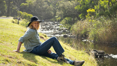 Rachel Lowry below the cliffs at Cumberland River on Gadubanud Country, VIC. Photo: Coco McYork