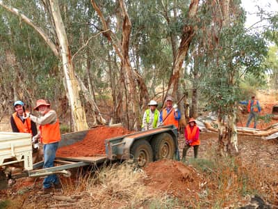 A volunteer working bee at Boolcoomatta Reserve.