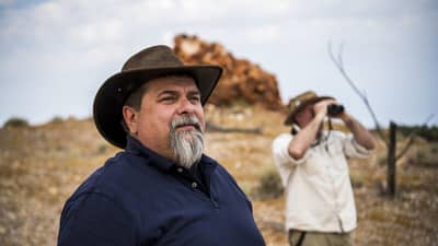 Bush Heritage staff Bruce Hammond and Graeme Finlayson look out at Evelyn Downs.