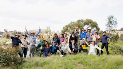 Volunteers and staff at a replanting day at Scottsdale Reserve, NSW.