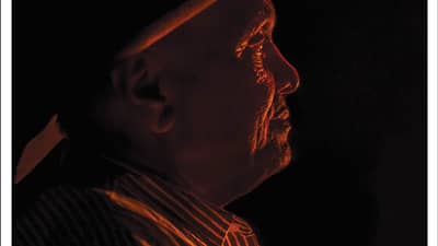 The front cover of Bushtracks Summer 2021 newsletter shows Mike Ross, Olkola Elder and Chairman of the Olkola Aboriginal Corporation.