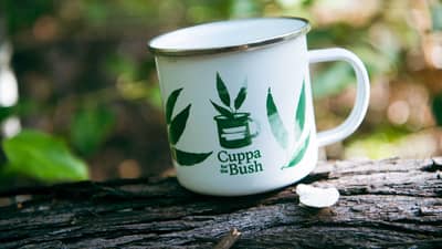 Coffee mug with logos of "Cuppa for the Bush" event.