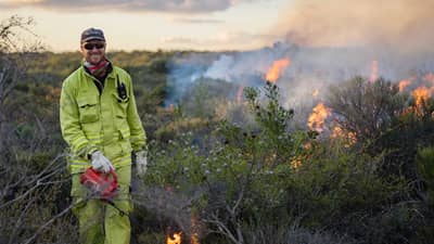 Alex Hamms conducts controlled burn at Chereninup Creek.
