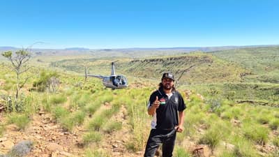 Bunuba Traditional Custodian Isaac Middleton helping with an aerial survey.