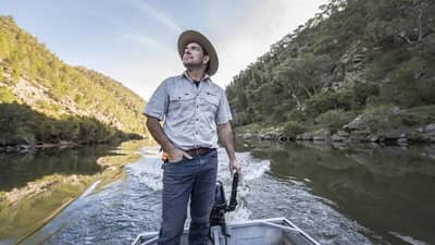 Bush Heritage Reserve Manager Phil Palmer sails on the Murrumbidgee River at Scottsdale Reserve.