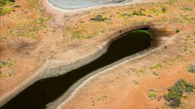 The front cover of Bushtracks Summer 2023 newsletter shows salt lakes and wetlands on Karajarri Country.