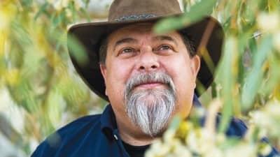 The front cover of Bushtracks Autumn 2024 newsletter features Bush Heritage Aboriginal Partnerships Officer Bruce Hammond.