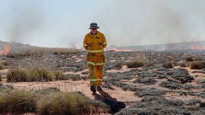 Reserve Manager Ingo Schomacker at a planned burn on Pilungah Reserve, Queensland.