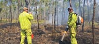 National fire team members Greg Carroll and Rhys Swain undertaking fire suppression at Yourka Reserve. Photo Lewi Marr.
