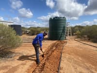 A straight trench line and a lot of hard work.