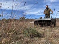 Phil Palmer operating a Grass Grabber.