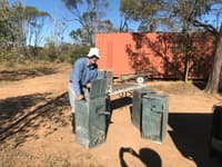 Paul repairing wallaby traps at Avocet.