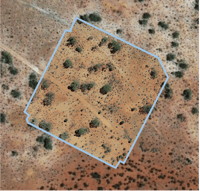 A drone survey orthomosaic within the blue boundary overlaid on a satellite image.