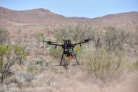 DJI Matrice 600 drone with a Li DAR sensor the yellow device beneath.