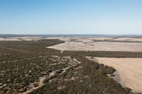 Aerial view of Dodgey Downs and neighbouring Bush Heritage reserves in the wider landscape, a patchwork of forested areas and cleared agricultural land.