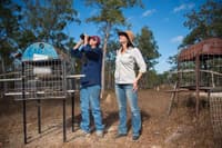 Sue Shephard and Ecologist Allana Brown with Alwal feeding stations.