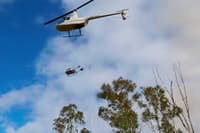 Helicopter conducting wet season burn. Photo Martin Willis.