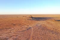 Aerial photograph of grass and saltbush plains at Boolcoomatta. Photo by Glen Norris