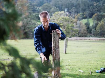Reserve Manager Mike Bretz fixing a fence post.
