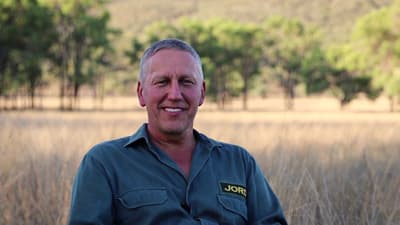 Angus Holden in grasslands at Carnarvon Station.