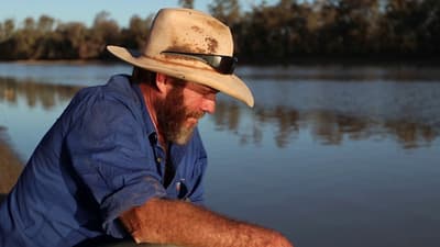 Greg Carrol with floodwater at Naree Station.