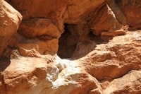 Owl roost with uric acid stains.