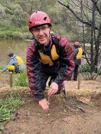 Steve replanting seedlings beside the Murrumbidgee River.