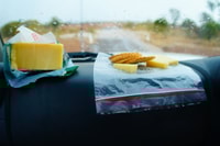 Picnic on the dashboard while waiting for flash flooding to recede.