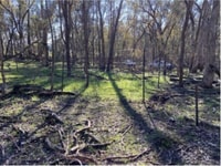 Outside the exclusion site.