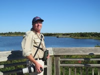 Paul Hackett doing what he loved best  - birdwatching.