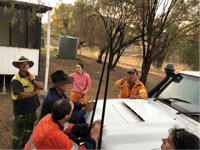 Healthy Landscape Manager Central Queensland Chris Wilson briefing fire crews before the night shift on the eastern flank of the fire.