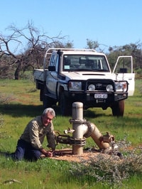 Rex taking a reading at Hamelin bore.