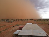A dust storm approaches the Pilungah homestead.