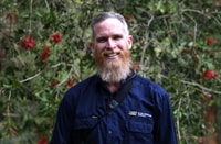 Bush Heritage ecologist Stephen Kearney, a man with short hair and a shaggy, ginger-and-white beard.