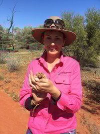 Bon Bon Station Field Officer Kate Taylor holding a Thorny Devil.