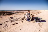 Dr Erica Suosaari on the beach at Hamelin Pool preparing for a biological survey. Photo Annette Ruzicka.