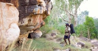 Fire is used to protect important cultural values, such as rock art sites. Photo by Mark Jones.