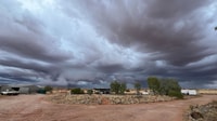Storm clouds over Ethabuka Reserve homestead, Wangkamadla Country, QLD. By Kyle Barton and Hélène Aubault