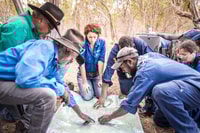 Consulting a map on Olkola reserve. Photo Annette Ruzicka
