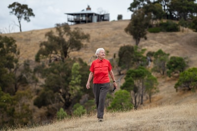 Long term supporter and volunteer Annelie Holden with the Round House in the background.