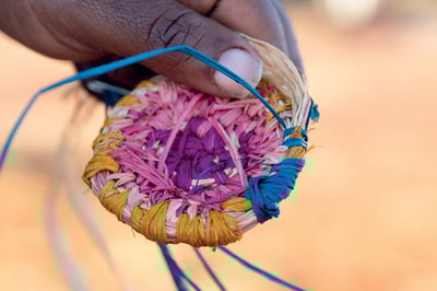 Knowledge is passed on and encoded during weaving sessions on Martu Country, Birriliburu Indigenous Protected Area, Western Australia. By Bee Stephens