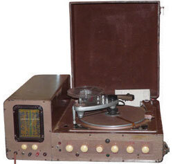 John’s invention incorporated a tape recorder, a radio and a turntable with two arms that both played and cut records. Photograph by Angie Smashnuk